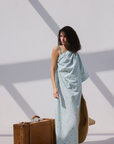 ONE SLEEVE DRESS WITH CONTRAST STRAPS AND RATTAN BELT