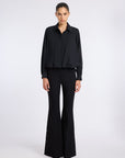 FLARED BLACK PANTS WITH BUTTON DETAIL