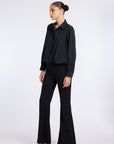 FLARED BLACK PANTS WITH BUTTON DETAIL
