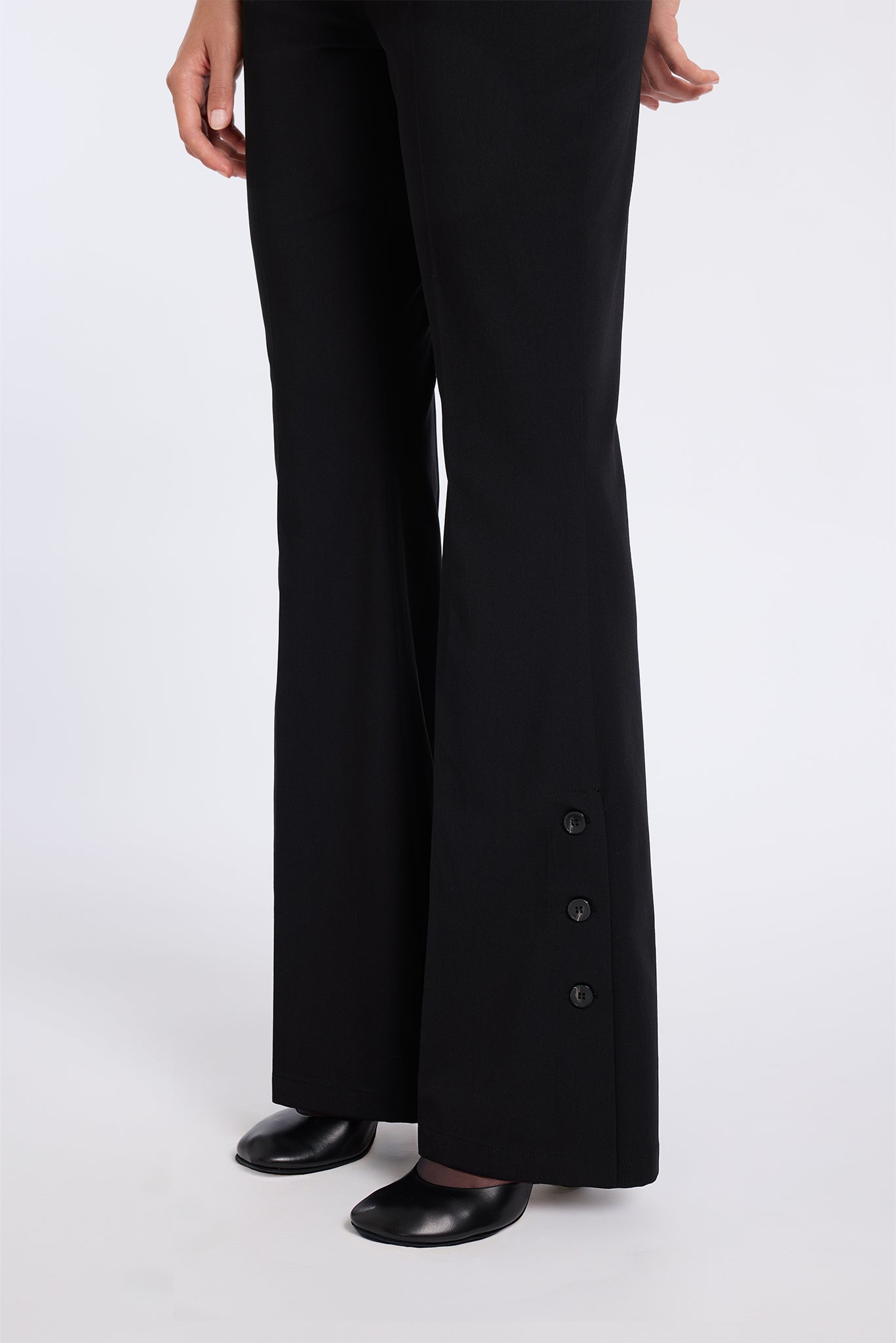 BLACK FLARED PANTS WITH BUTTON DETAIL