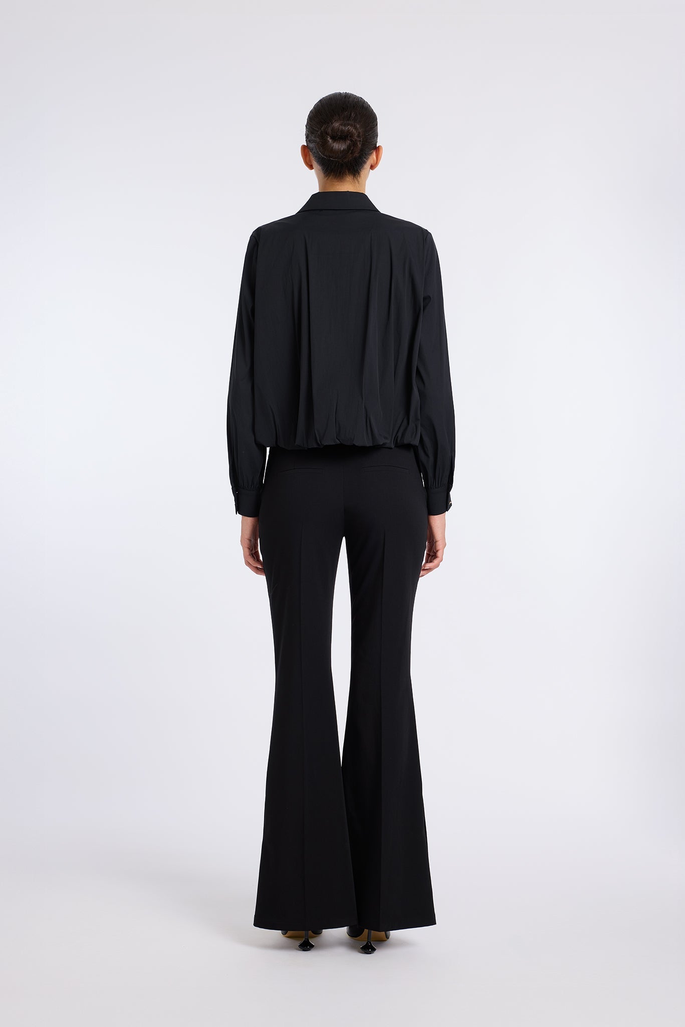 BLACK FLARED PANTS WITH BUTTON DETAIL