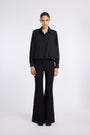 FLARED BLACK PANTS WITH BUTTON DETAIL
